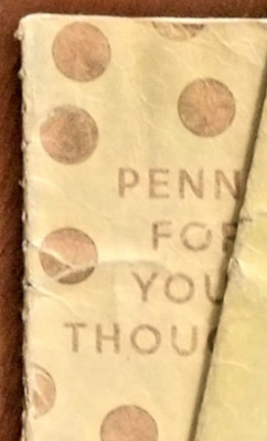 Cover of notebooks with text “Penny for your thoughts” partially obscured.