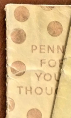 Cover of notebooks with text “Penny for your thoughts” partially obscured.